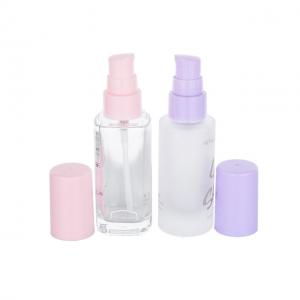 China 30ml Transparent Empty Foundation Bottle With Pink Or Purple Plastic Caps on sale