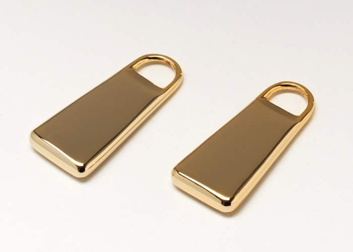 China 30 * 13 * 4mm Stocked Handbag Accessories Hardware Golden Zipper Pull For Bag on sale