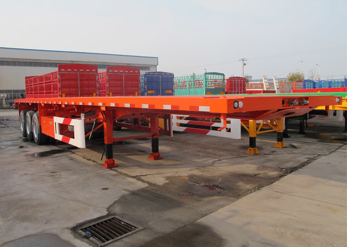 China CIMC 40 feet flatbed truck trailer 3 axle flatbed container semi trailer with container lock on sale