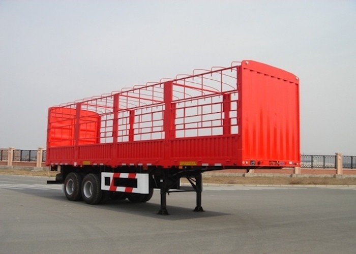 China 30ft Carbon Steel Stake Drop Side Trailer 2 Axles With Side Wall And Cargo Fence on sale