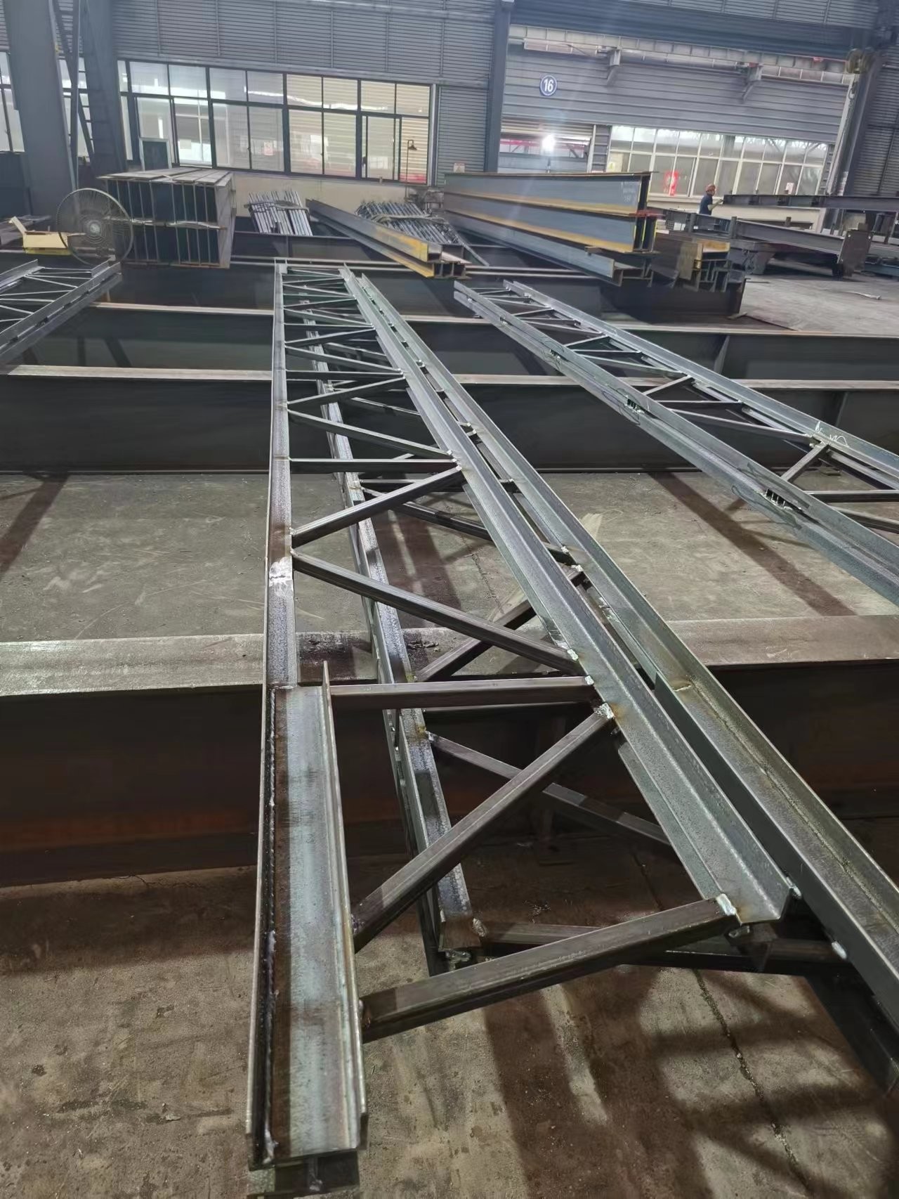 China Steel Structure Building ASTM Standard Prefeb Painted Steel Floor Joists and Decking on sale
