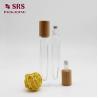 Buy cheap SRS cosmetic clear 10ml perfume square glass roller bottle with bamboo cap from wholesalers