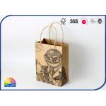 China Stand Up Packaging Kraft Paper Bags Black Printing With Handles for sale