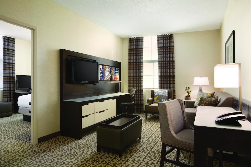 Hotel Executive Suite Bedroom Furniture Double Bed with TV storage Cabinets by Dark oak wood and Reception Living Sofa