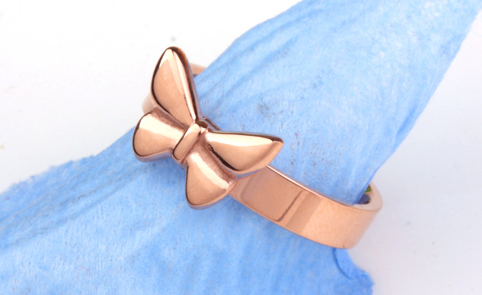 China Fashion women jewelry titanium steel ring 14K gold plated bowknot bands finger ring on sale