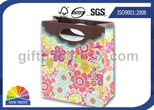 China Cute Personalized Small Wrapping Paper Gift Bag with Die Cut Handle for Gift Packaging on sale