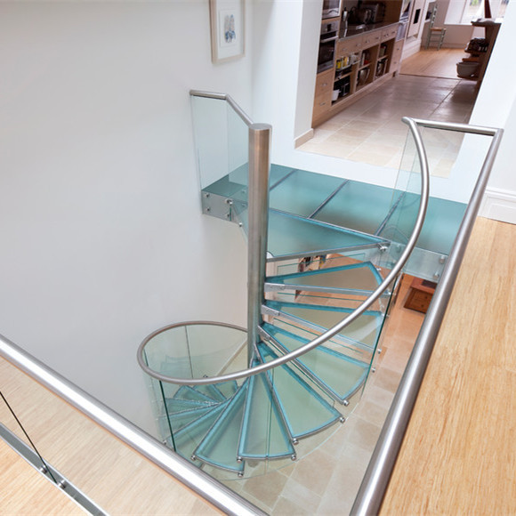 China Interior spiral staircase prices with stainless steel stair railing on sale