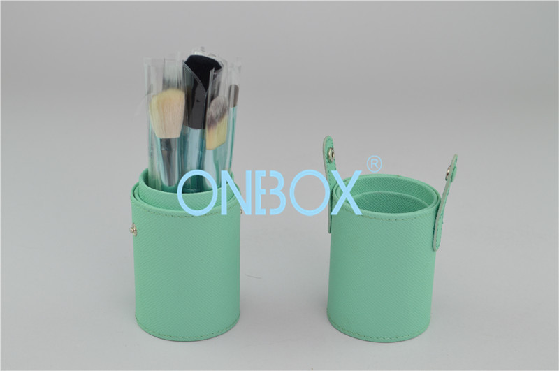 China Unique Luxury Cosmetic Box With A Set Of Brushes Light Green Leather With Buckle on sale