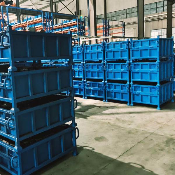 Stackable metal pallet box in warehouse setting