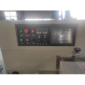 Energy-saving flow wrapping machine with intelligent heat sealing temperature