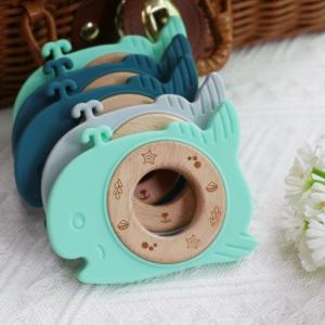China BPA Free Silicone Baby Teether With Wooden Ring Teething Relief For Babies Durable on sale