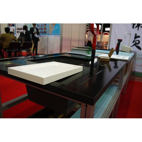 Chemical resistance monolithic drop In sinks for testing center